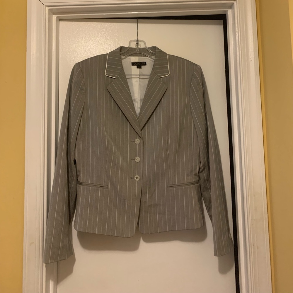 Silver with white strips skirt with jacket. Very good condition.